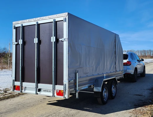 Прицеп бортовой двухосный без тормоза ССТ-7132-65-У (платформа Ш=1510 мм)