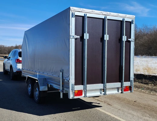 Прицеп бортовой двухосный без тормоза ССТ-7132-65 (платформа Ш=1768 мм)