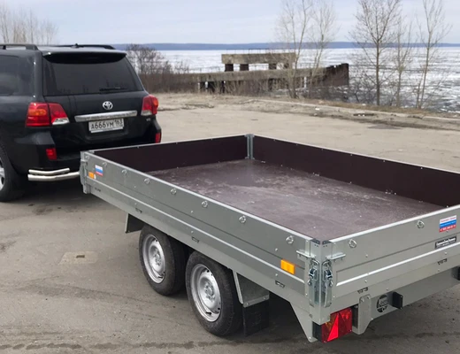 Прицеп бортовой двухосный с тормозом ССТ-7132-25 (платформа Ш=1821 мм)