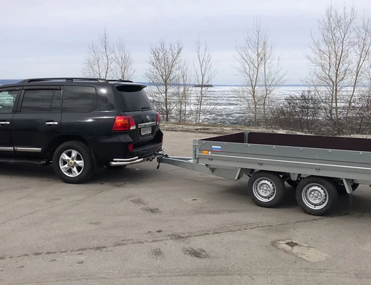 Прицеп бортовой двухосный без тормоза ССТ-7132-27 (платформа Ш=1821 мм)