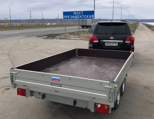 Прицеп бортовой двухосный без тормоза ССТ-7132-27 (платформа Ш=1821 мм)