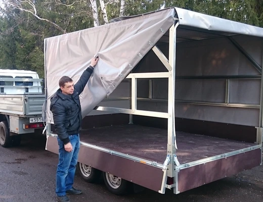 Прицеп бортовой двухосный без тормоза ССТ-7132-30 (платформа Ш=2047 мм)