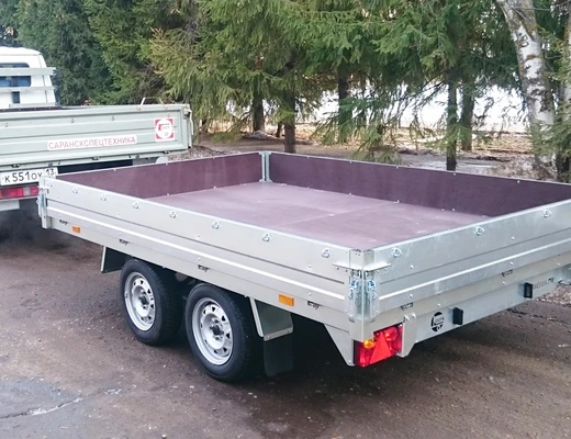 Прицеп бортовой двухосный с тормозом ССТ-7132-31 (платформа Ш=2047 мм)