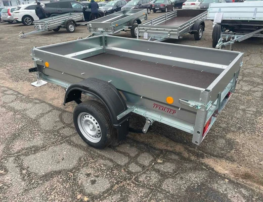 Прицеп Treiler Модель 829400 Исполнение 3,0 х1.50 рес3 Товарищ БЕЗ КОЛЕС борт 495 мм